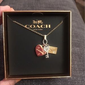 Coach long charm necklace